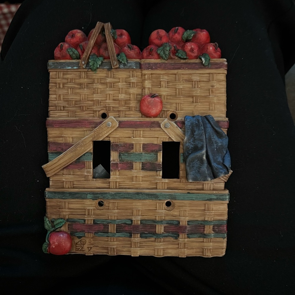 Double light switch cover Basket with apples.